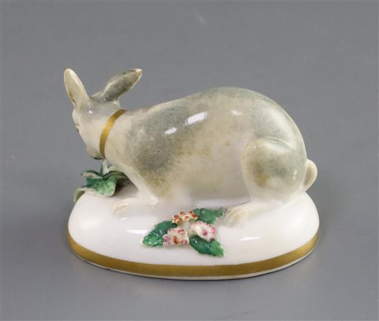 A Rockingham porcelain figure of a recumbent rabbit, c.1830, L. 7cm